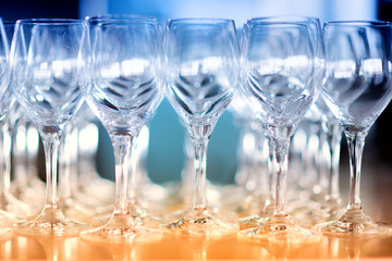 Lots of wine glasses during some festive event
