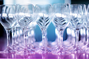 Lots of wine glasses during some festive event