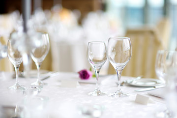Fototapeta premium Beautiful table setting with crockery and flowers for a party, wedding reception or other festive event