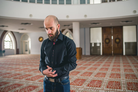 Humble Muslim standing in prayer