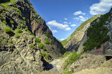 Obraz premium Cycling mountain road. Misty mountain road in high mountains.. Cloudy sky with mountain road. Big Caucasus. Azerbaijan Lahic