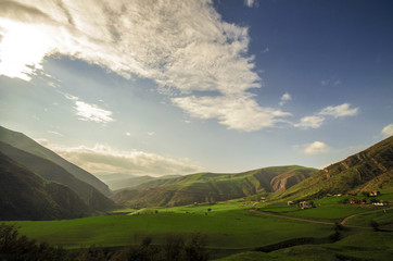 Beautiful landscape in the mountains with the sun at dawn. Mountains at the sunset time. Azerbaijan, Talish Mountains. Yardimli