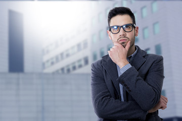 modern business man with thoughtful expression