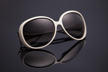 sunglasses on a black background