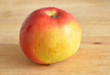 Red apple on wooden.