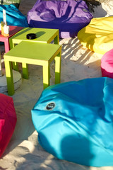 Lounge mattresses on the beach sand