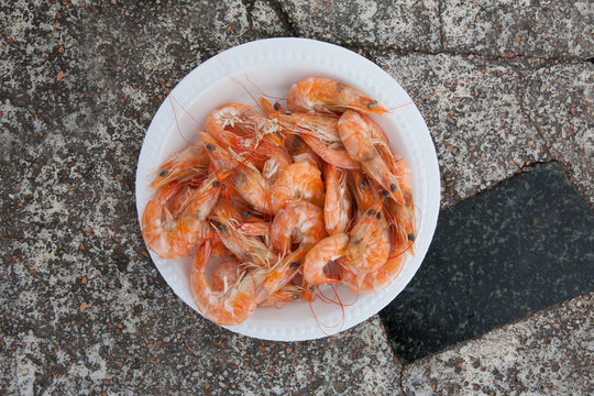 Thai street food Seafood steam shrimp in Foam bowl, top view
