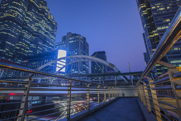 office building and traffic light in sathorn road silom most important business center in bangkok thailand capital