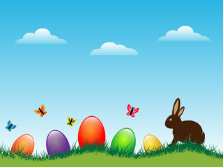 Easter Background with Rabbit and Shiny Eggs on the Meadow.Holiday Background.