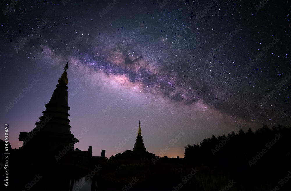 Wall mural milky way with two pagoda in chiang mai