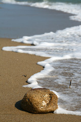 Soft wave of the sea on the sandy beach