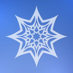 Abstract decorative element on a blue background. Star.