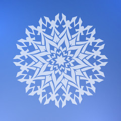 Abstract decorative element on a blue background. Star.