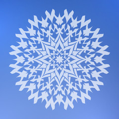 Abstract decorative element on a blue background. Star.