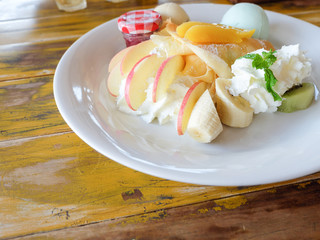 crepe with fresh fruit  on wooden table