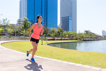 Woman running at bangkok city