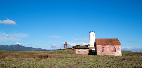 Fototapeta na wymiar Red Brick Fog Signal Building at the Piedras Blancas Lighthouse on the Central California Coast US of A