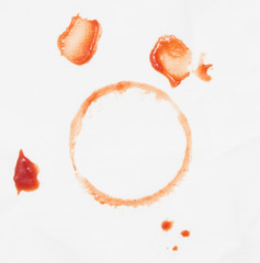 round spots from the ketchup on a white material