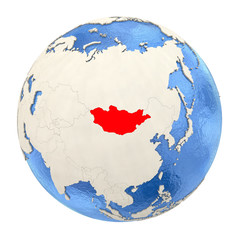 Mongolia in red on full globe isolated on white