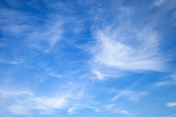 Light cirrus clouds on blue sky, background - obrazy, fototapety, plakaty