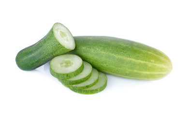 whole and sliced fresh cucumber on white background