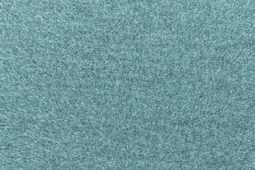 texture of fleece fabric pale blue green color © malven