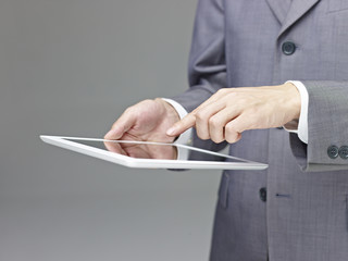 businessperson using a tablet