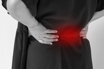 woman suffering from back pain, spinal injury, muscle issue problem