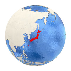 Obraz premium Japan in red on full globe isolated on white