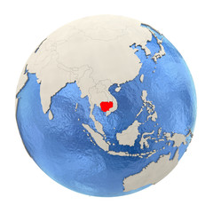 Cambodia in red on full globe isolated on white