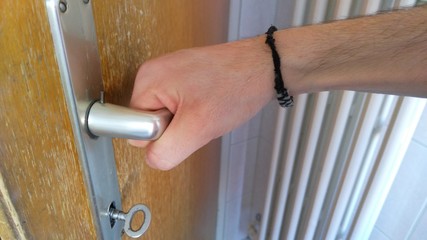 Man opening a door