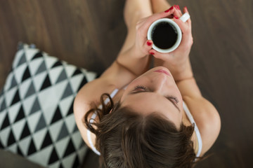 Beautiful woman having coffee in the morning