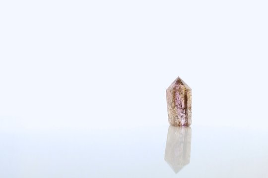 Amethyst crystal isolated on white background