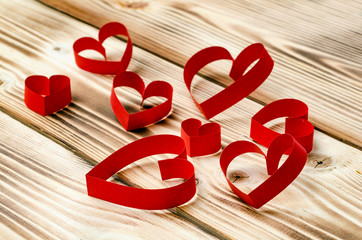 Happy Valentine's Day. Hearts on a wooden background. Love. Celebratory background
