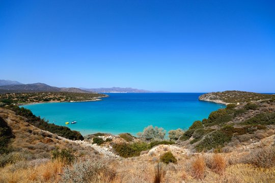 Elevated view of the beach and coastline with mountains to the rear, Istro, Crete.