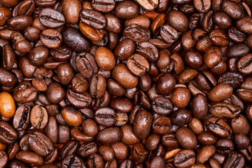 Roasted coffee beans close-up. Aromatic background
