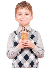Portrait of cheerful little boy with ice cream cone. Close-up of child eating ice-cream with chocolate, isolated on white background.