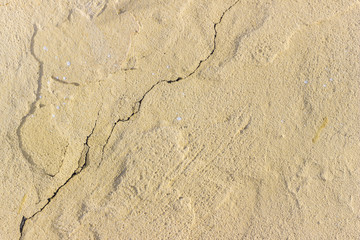 Uneven concrete surface. Crack along the entire length
