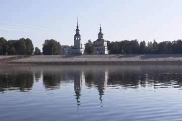Fototapeta na wymiar View from the river Sukhona on a church of St. Nicholas in the city of Veliky Ustyug on a summer morning, Vologda region, Russia