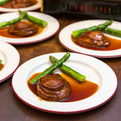 Cantonese cuisine whole abalone with asparagus