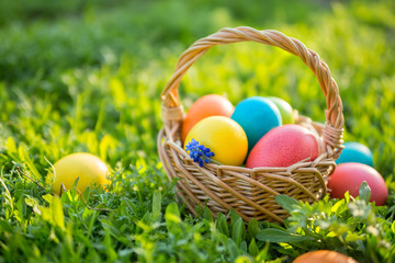 Happy Easter. Colorful Easter eggs in a basket, closeup shot © valya82