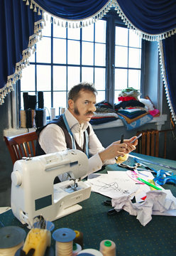 Clothes designer in the studio