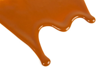 Caramel sauce isolated on a white background