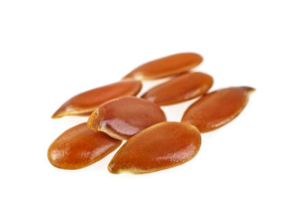 Close up of flax seeds isolated on white background, selective focus