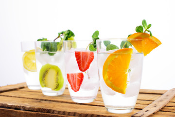 Refreshing summer mocktails or cocktails isolated on white