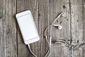 Mobile phone on wooden table