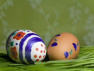 Painted Colorful Easter Eggs on green Grass