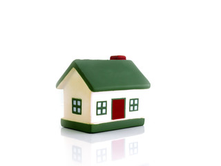 Miniature houses mortgage and real estate investment or property insurance