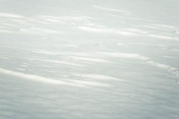 A beautiful closeup pattern of snow in a Norwegian winter day