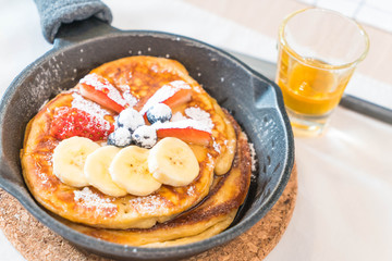pancake with fresh strawberry blueberry and banana